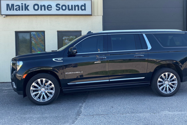 2023 GMC Yukon with professional window tint in North Bay